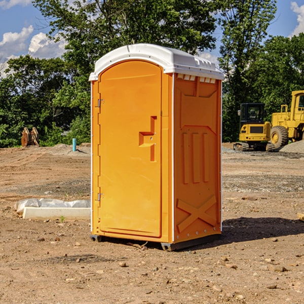 how often are the portable restrooms cleaned and serviced during a rental period in Ford County